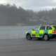 Ambulance parked by a river